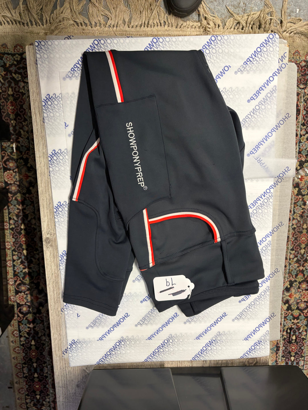 Lot 79- Adult medium riding tights- SPP Team Design