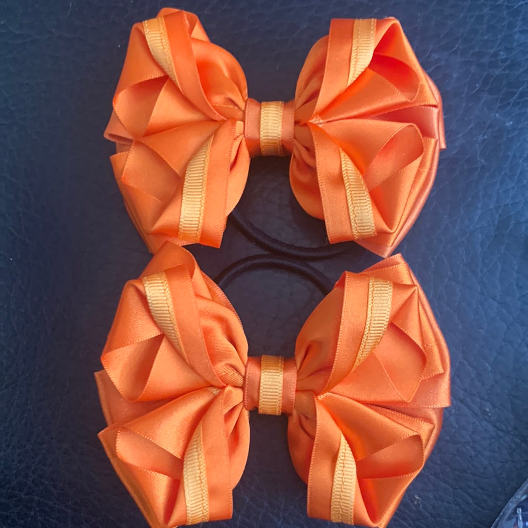 Designer Bows Luxury Bows: Orange bows with twist design – Showponyprep.com
